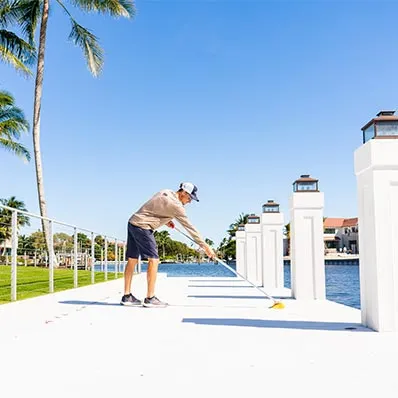 Island Home and Estate Management Guy cleaning